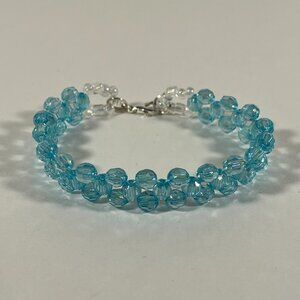 Light Blue Faceted Acrylic Bead Bracelet with Cross Weave Pattern NWT